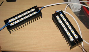 LEDs with heatsinks. ~21W per module.